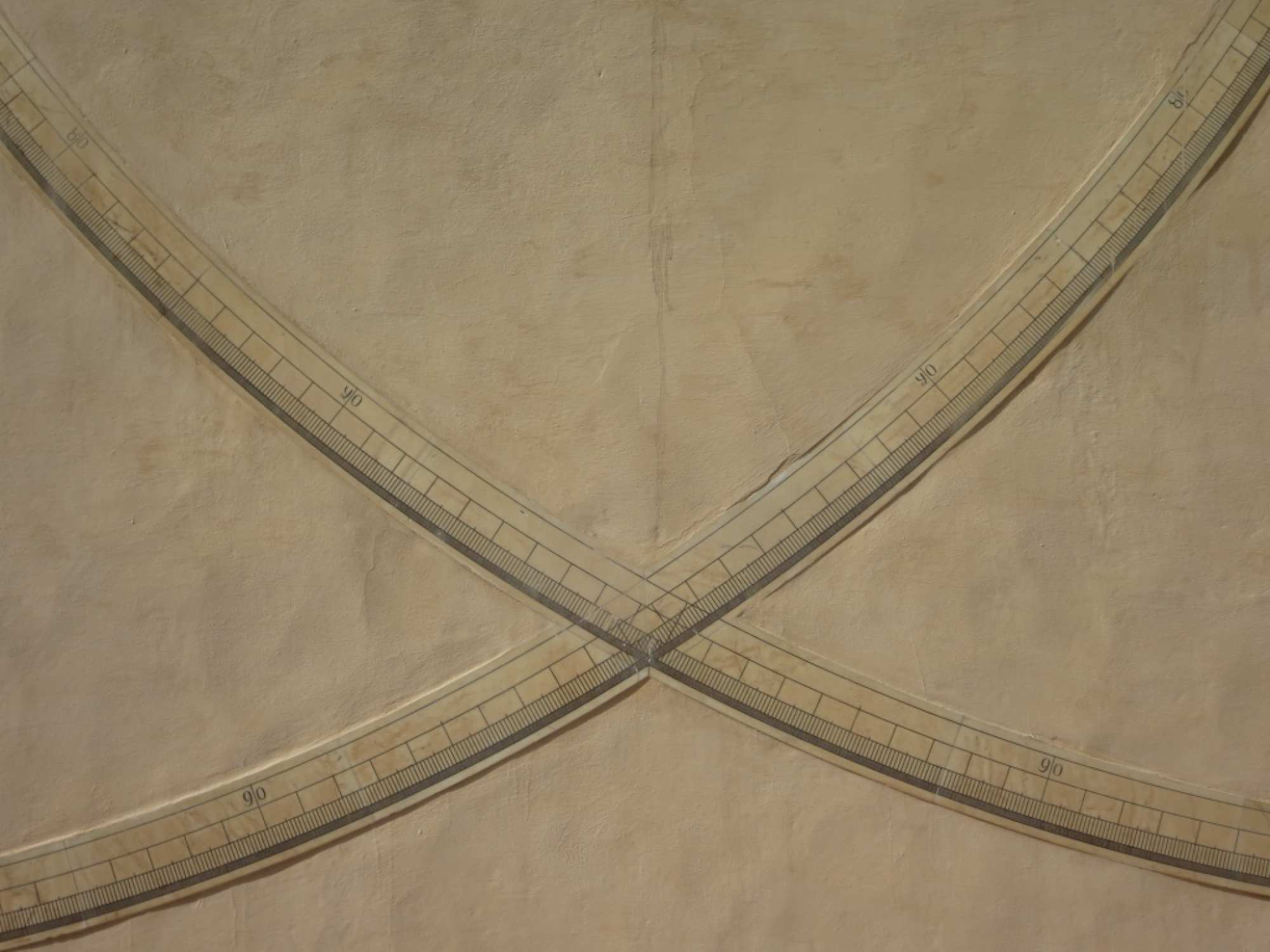 tan with curved cross